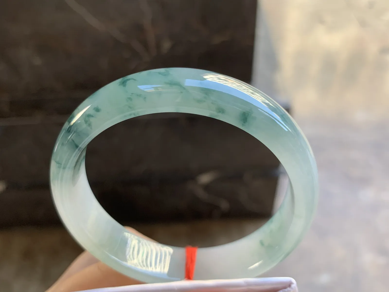 58-14.3-7.2mm
冰种飘花手镯 水润光泽 花色灵动