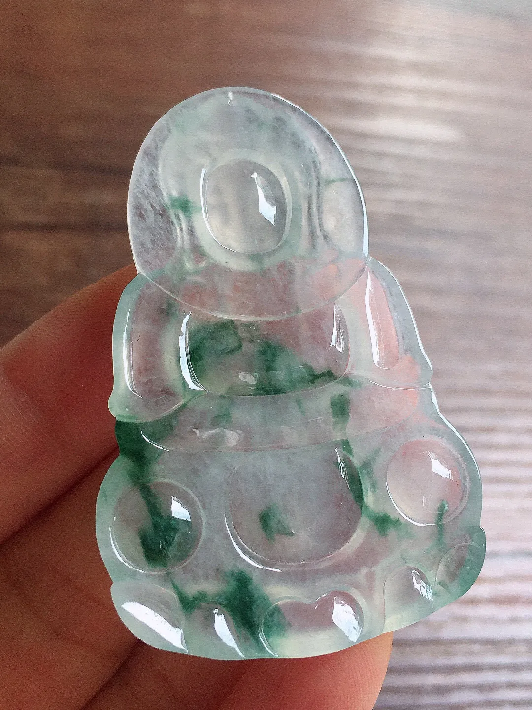 冰飘花观音，冰润细腻，品相好，种水足 尺寸57*36.8*5