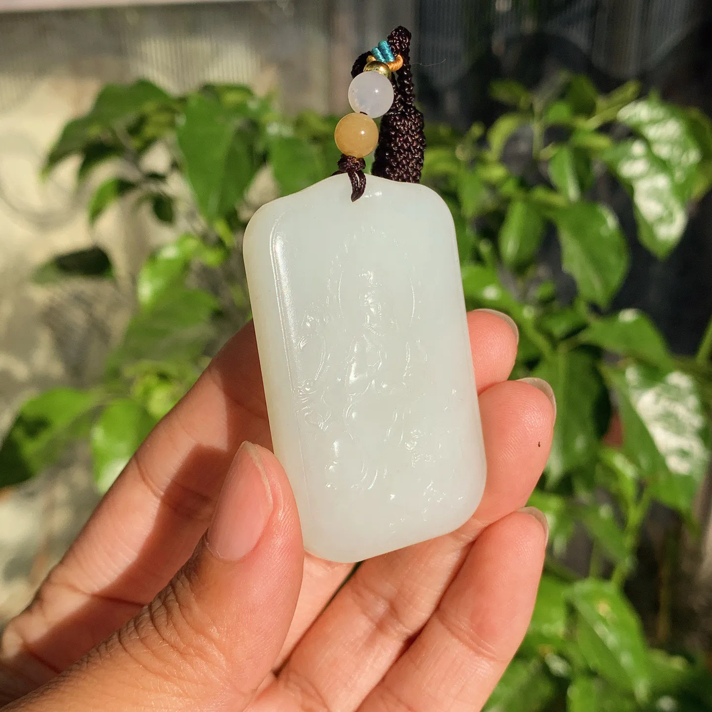 和田玉白玉文殊菩萨牌子挂件。尺寸53/33/9.5重39.5克。玉质细腻油润。手推出油。品相大气。lt251120