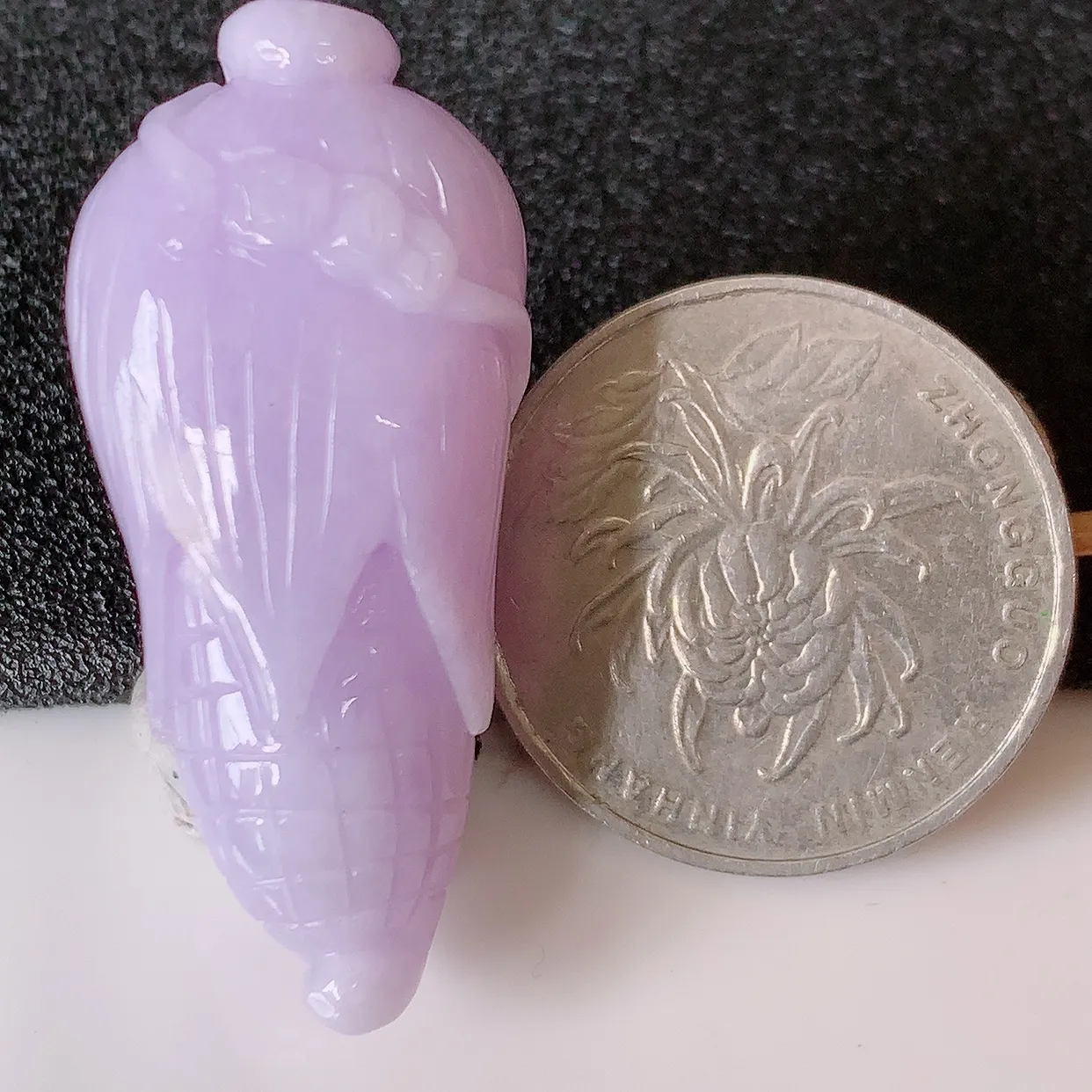 自然光实拍，冰润紫罗兰翡翠玉米吊坠，多子多福，种老水足，雕工精湛 ，寓意美好，佩戴时尚出众！#05.22