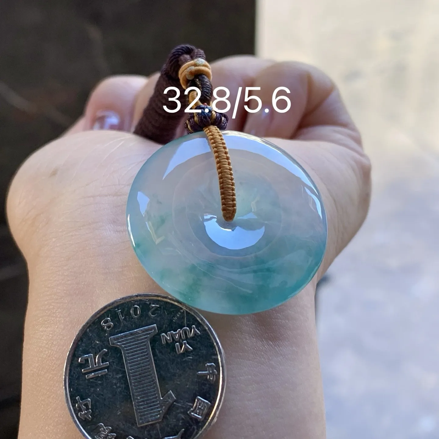 冰种飘花平安扣
花色漂亮