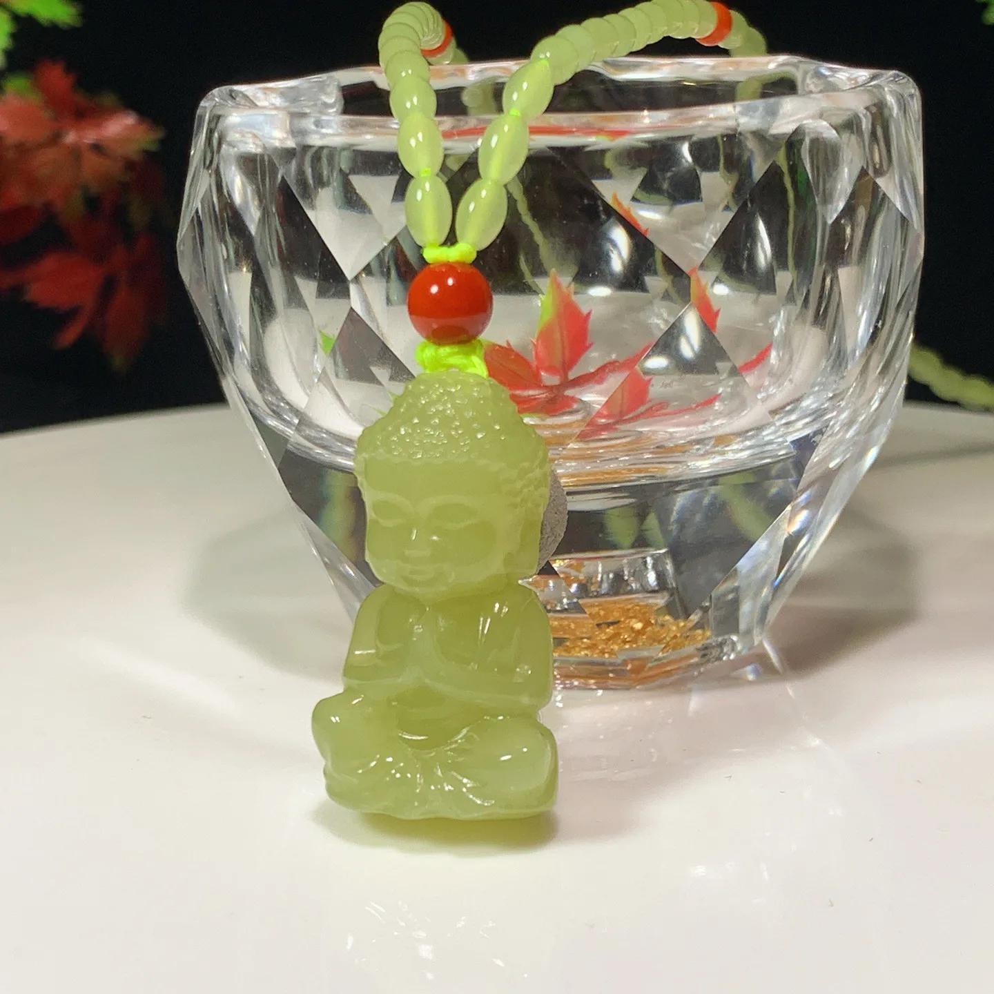 新疆和田玉若羌黄口料宝宝佛挂件。尺寸31/18/14重21.7克。玉质细腻油润。手推出油。佩戴高端典