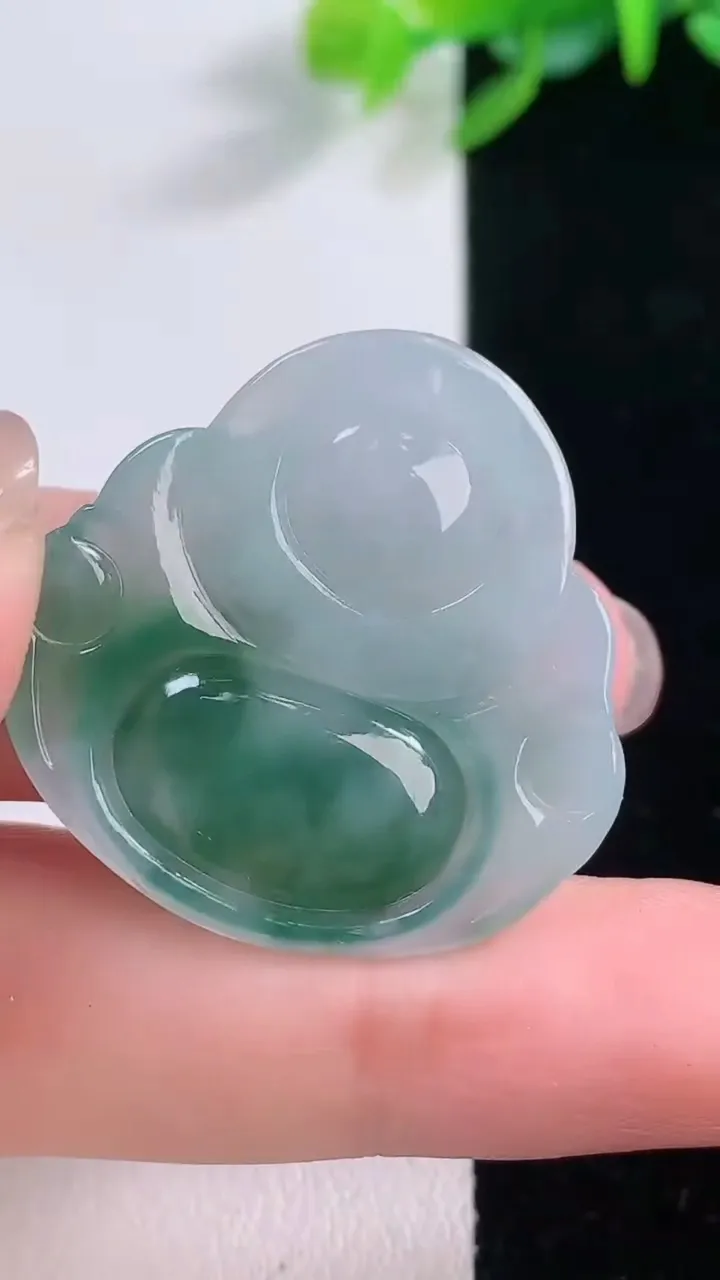 天然A货翡翠冰种飘花佛公吊坠，尺寸30.3-31.4-5.3，重量:7.77g
12月1日