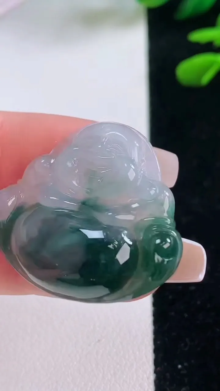 天然A货翡翠冰种飘花佛公吊坠，尺寸28.5-32.2-5.7，重量:7.61g
12月2日