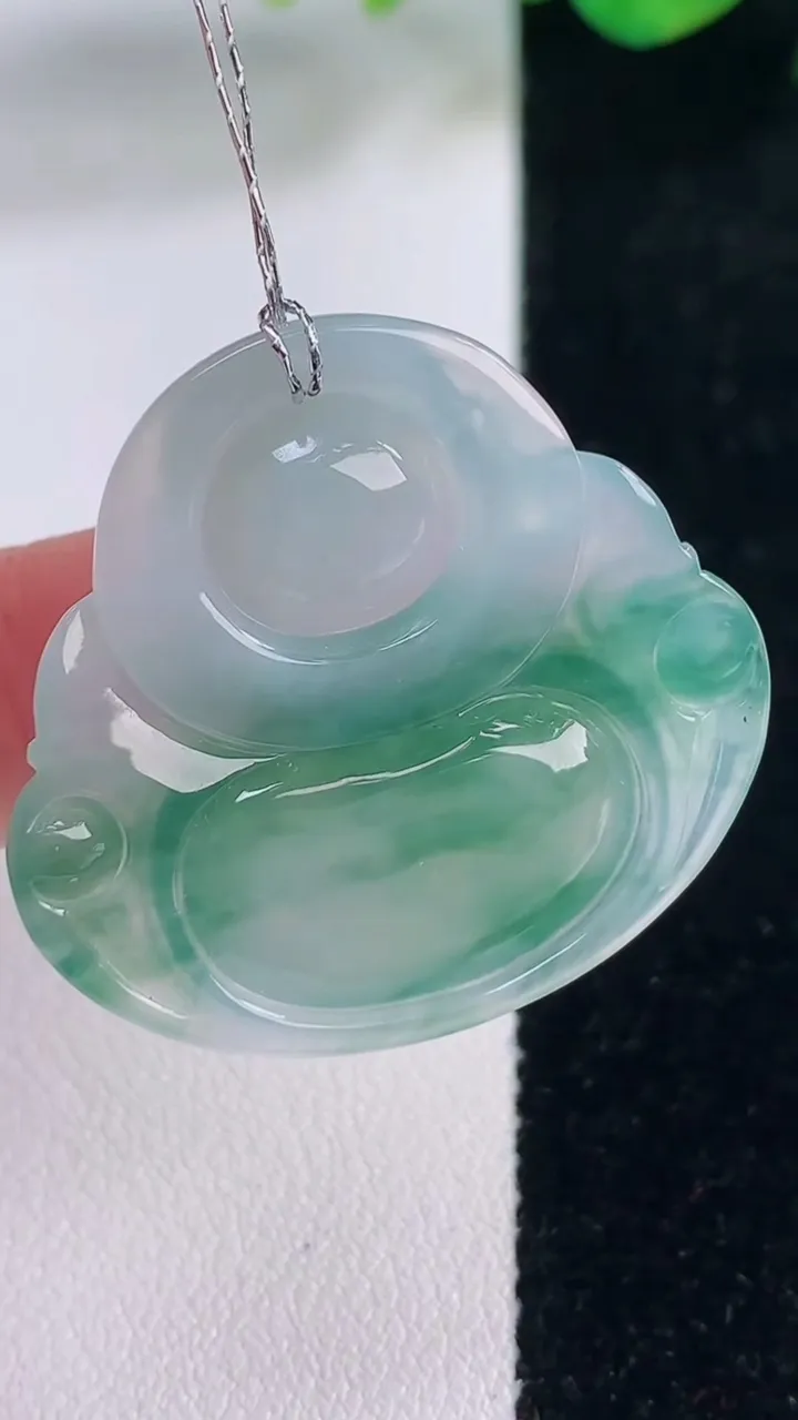 天然A货翡翠冰种飘花佛公吊坠，尺寸31.8-34-5.7，重量:9.49g
12月2日