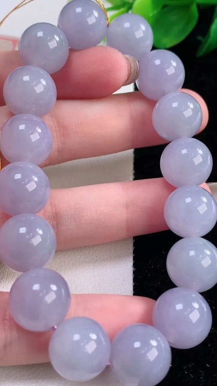 天然A货翡翠紫罗兰圆珠手串，尺寸12.4-16颗，重量:56.24g12月2日
工厂直销收藏佳品,种