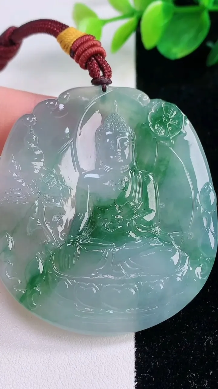 天然A货翡翠种飘花阿弥陀佛吊坠，尺寸56.5-51.6-5.4，重量:36.01g
12月2日
