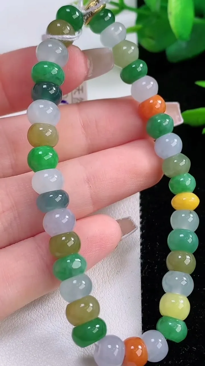 天然A货翡翠四彩算盘珠手串，尺寸7-5-34颗，重量:19.82g12月5日
工厂直销收藏佳品,种好水足，色泽均匀，有种有色，上手高大气！