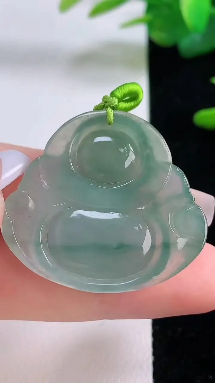 天然A货翡翠冰种飘花佛公吊坠，尺寸31.2-34.6-6，重量:9.65g
12月5日