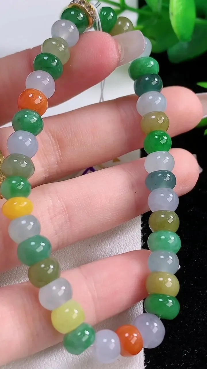 天然A货翡翠四彩算盘珠手串，尺寸7-5-34颗，重量:19.82g12月5日
工厂直销收藏佳品,种好