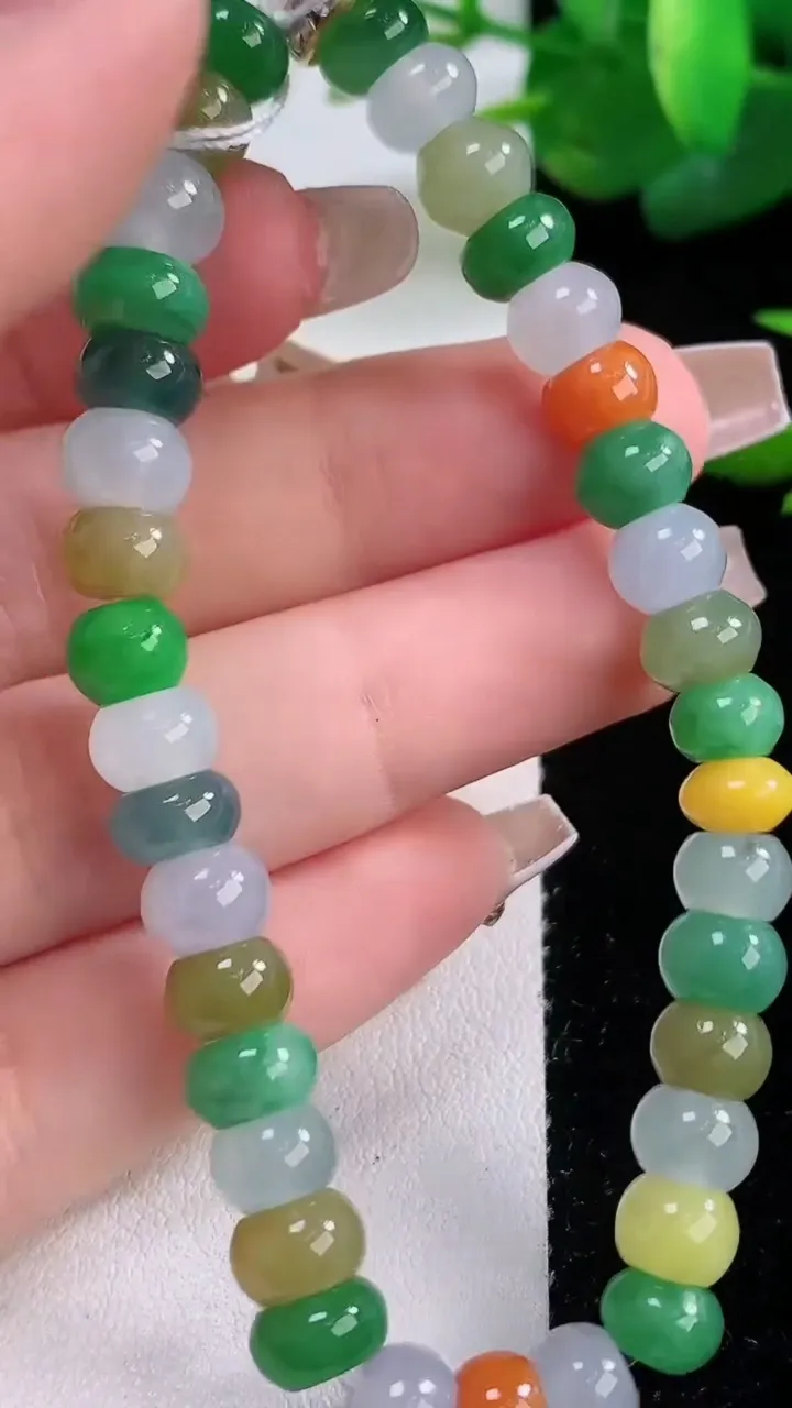 天然A货翡翠四彩算盘珠手串，尺寸7-5-34颗，重量:19.82g12月5日
工厂直销收藏佳品,种好水足，色泽均匀，有种有色，上手高大气！