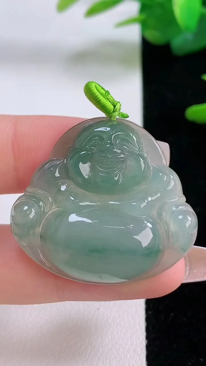 天然A货翡翠冰种飘花佛公吊坠，尺寸31.2-34.6-6，重量:9.65g
12月5日