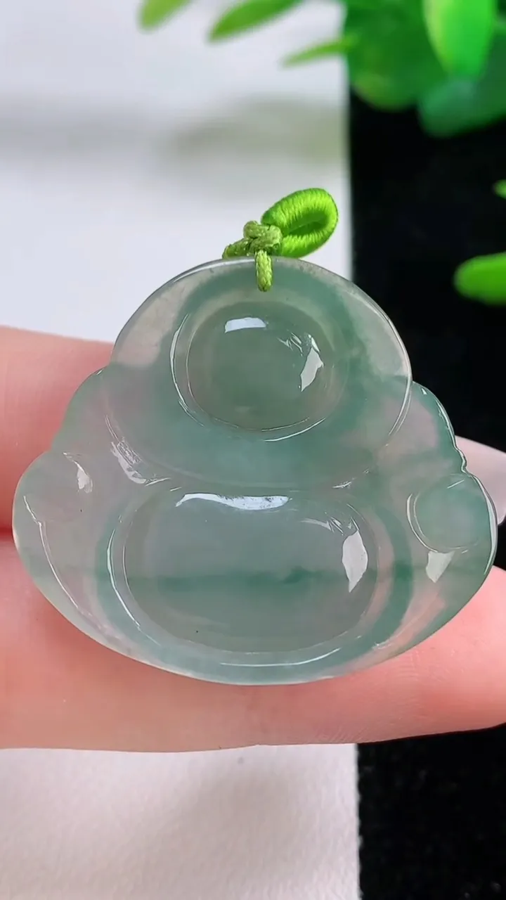 天然A货翡翠冰种飘花佛公吊坠，尺寸31.2-34.6-6，重量:9.65g
12月5日