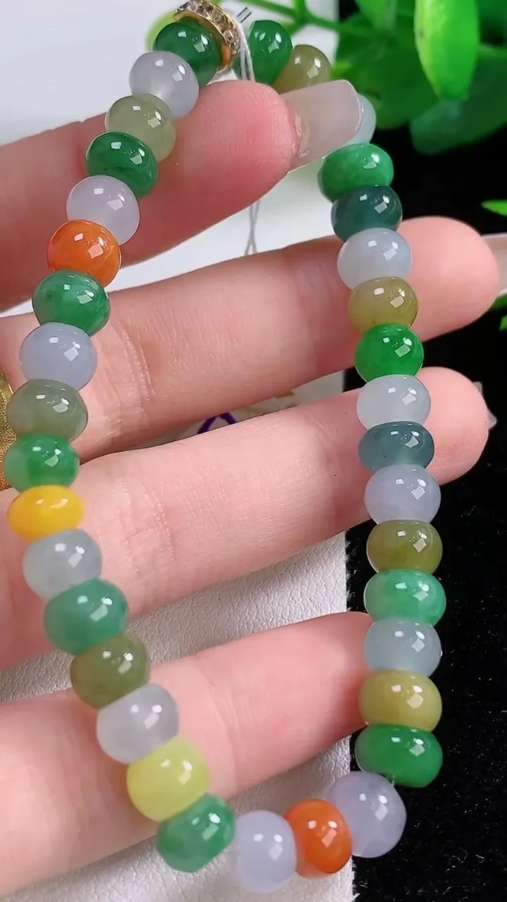 天然A货翡翠四彩算盘珠手串，尺寸7-5-34颗，重量:19.82g12月5日
工厂直销收藏佳品,种好水足，色泽均匀，有种有色，上手高大气！