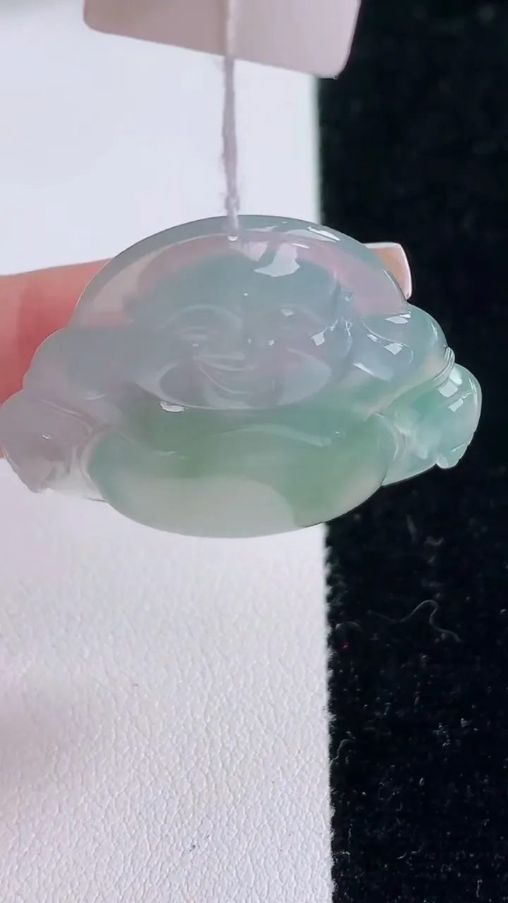 天然A货翡翠种飘花佛公吊坠，尺寸32.5-34.6-6，重量:10.31g
12月7日