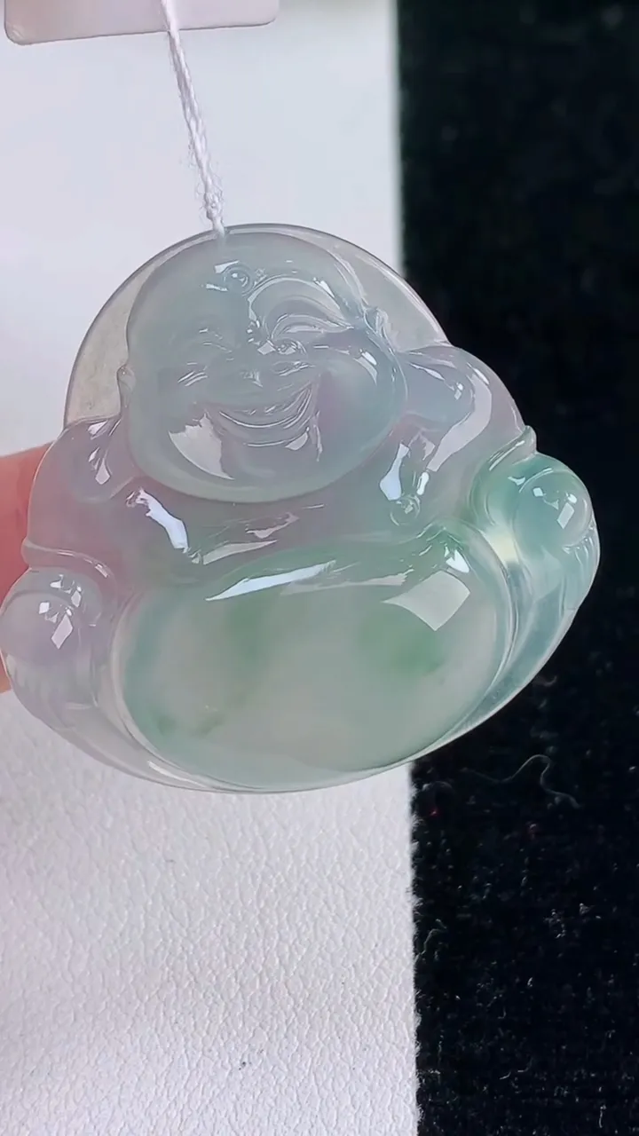 天然A货翡翠种飘花佛公吊坠，尺寸32.5-34.6-6，重量:10.31g
12月7日
