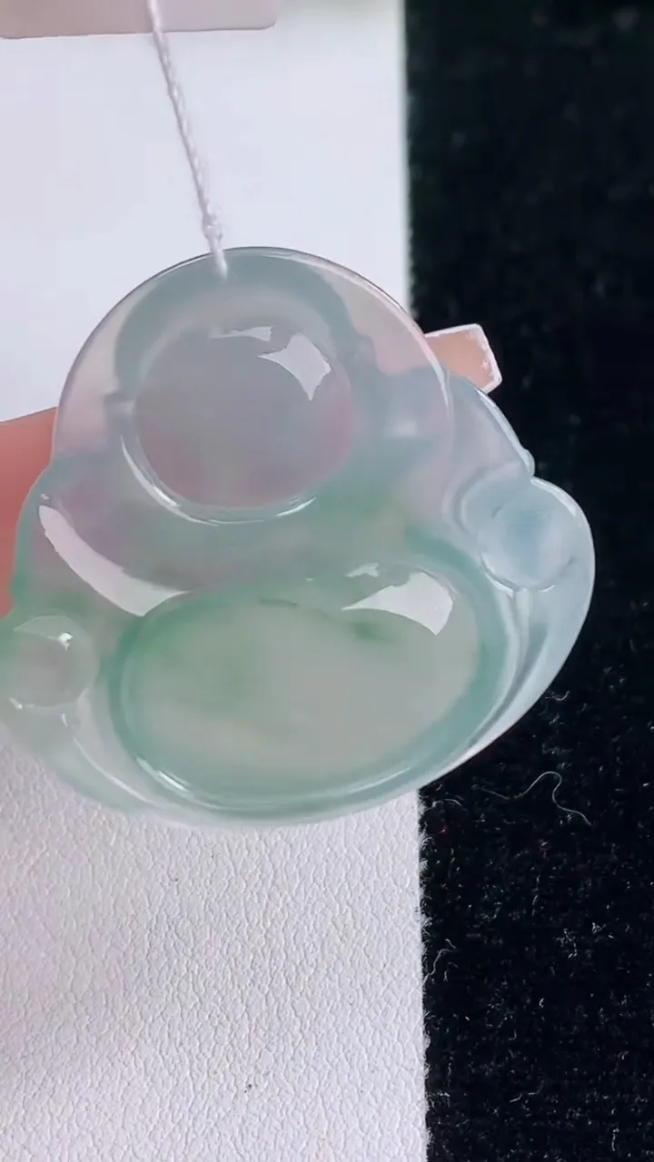 天然A货翡翠种飘花佛公吊坠，尺寸32.5-34.6-6，重量:10.31g
12月7日