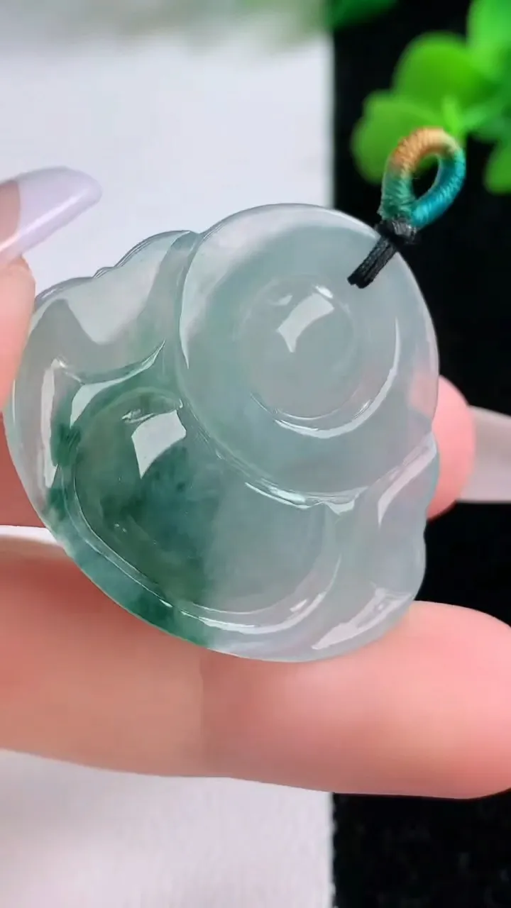 天然A货翡翠冰种飘花佛公吊坠，尺寸30.7-34.6-6，重量:9.39g
12月8日