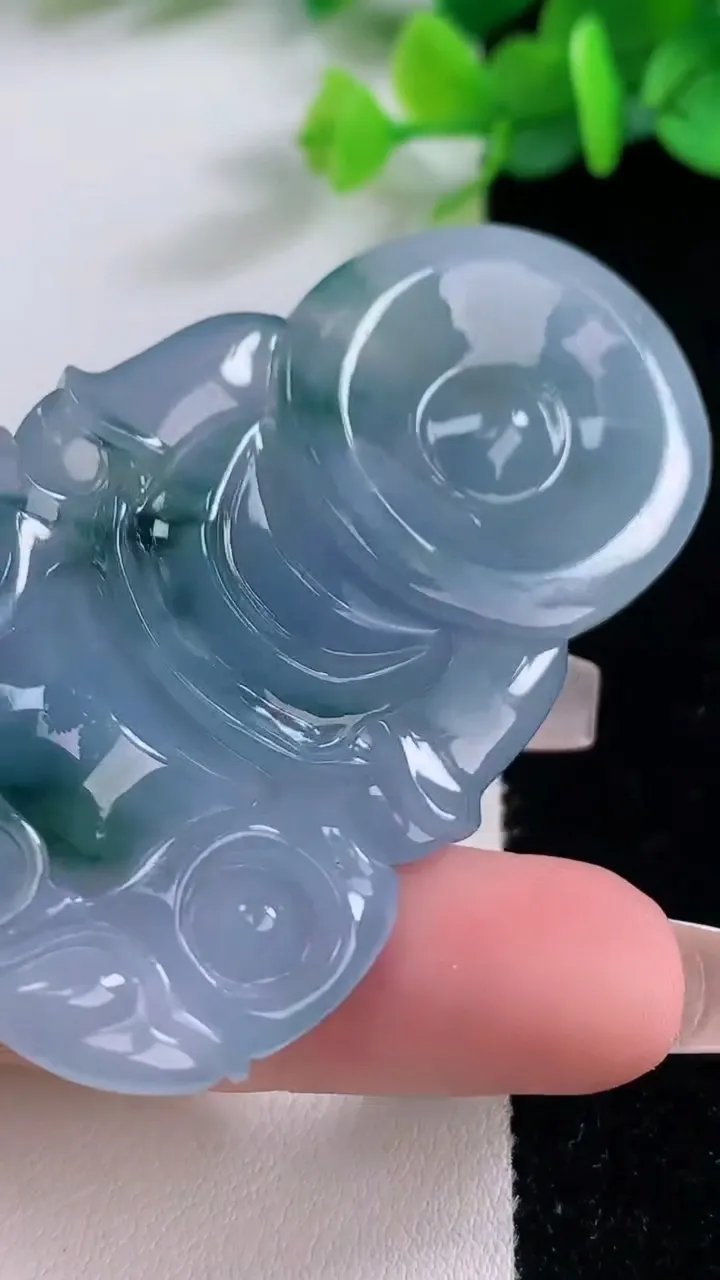 天然A货翡翠紫罗兰飘花观音菩萨吊坠，尺寸65.3-40.5-8.5，重:33.45g
12月8日