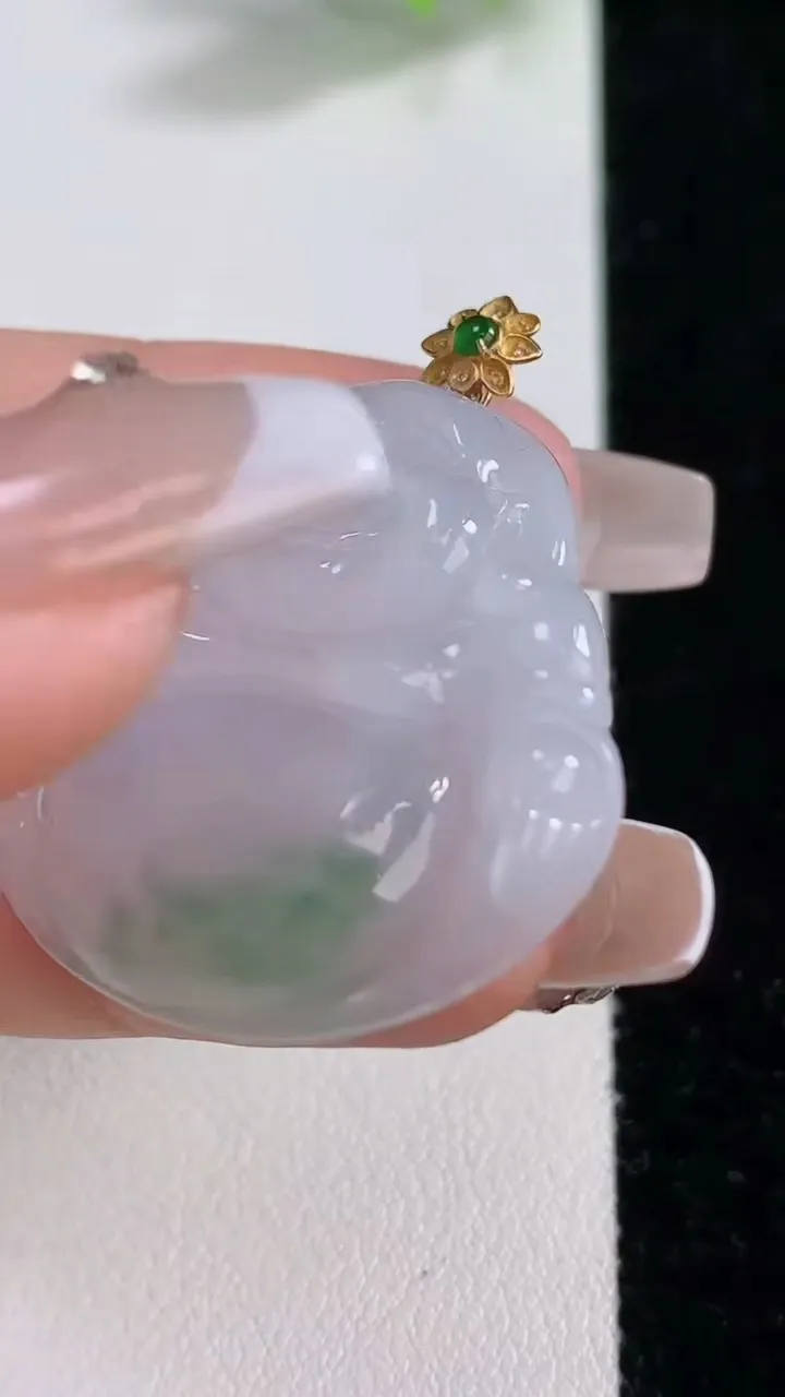 天然A货翡翠种飘花佛公吊坠，尺寸31.5-33.2-6，重量:10.62g
12月10日