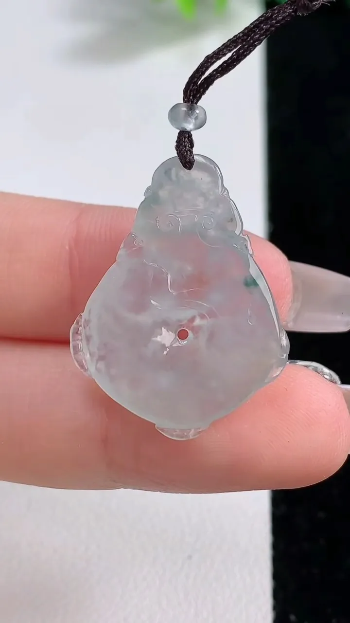 天然A货翡翠冰种飘花龙牌吊坠，尺寸27-21-4.5，重量:3.85g
12月10日