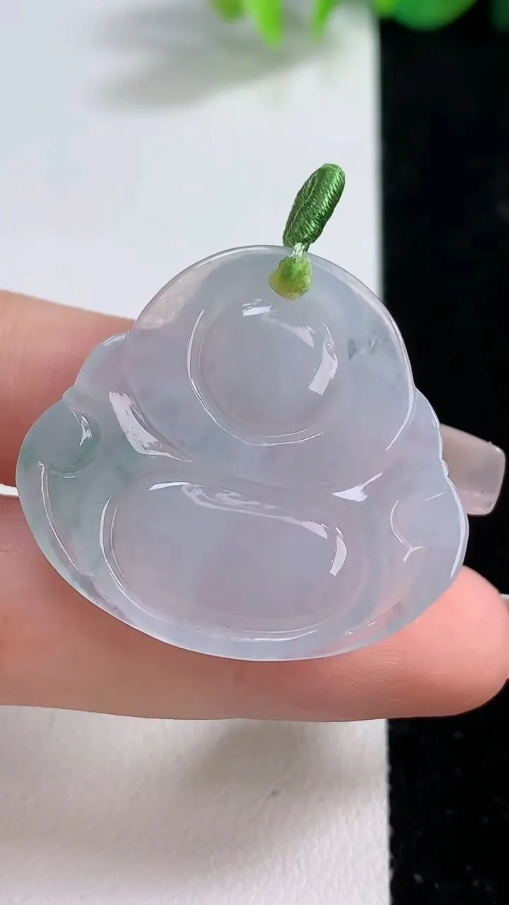 天然A货翡翠冰种飘花佛公吊坠，尺寸31.7-34.6-5.8，重量:9.35g
12月10日