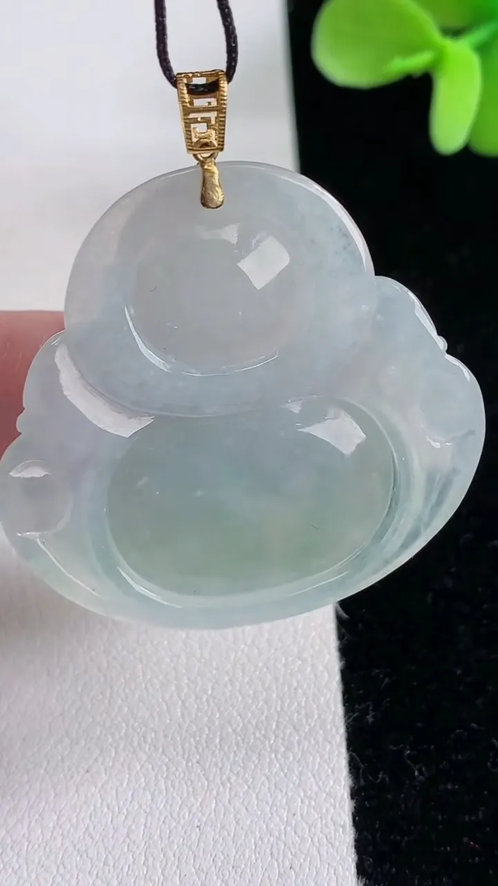 天然A货翡翠18K金飘花佛公吊坠，尺寸33.7-35.7-5.6，重量:10.37g
12月12日