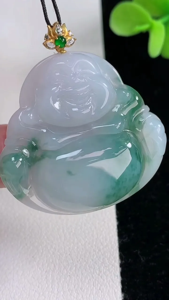 天然A货翡翠种飘花佛公吊坠，尺寸34.5-37-5.4，重量:11.61g
12月12日