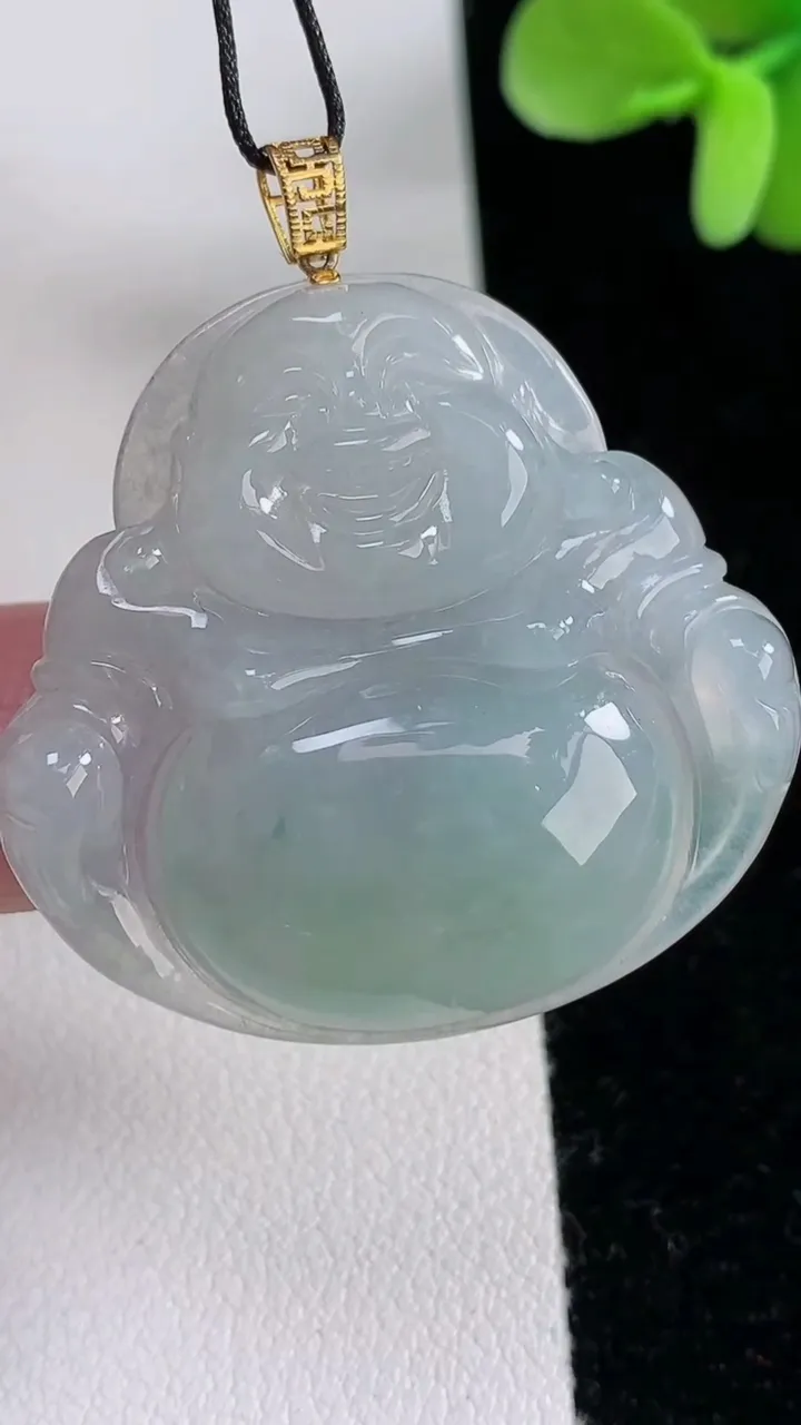 天然A货翡翠18K金飘花佛公吊坠，尺寸33.7-35.7-5.6，重量:10.37g
12月12日