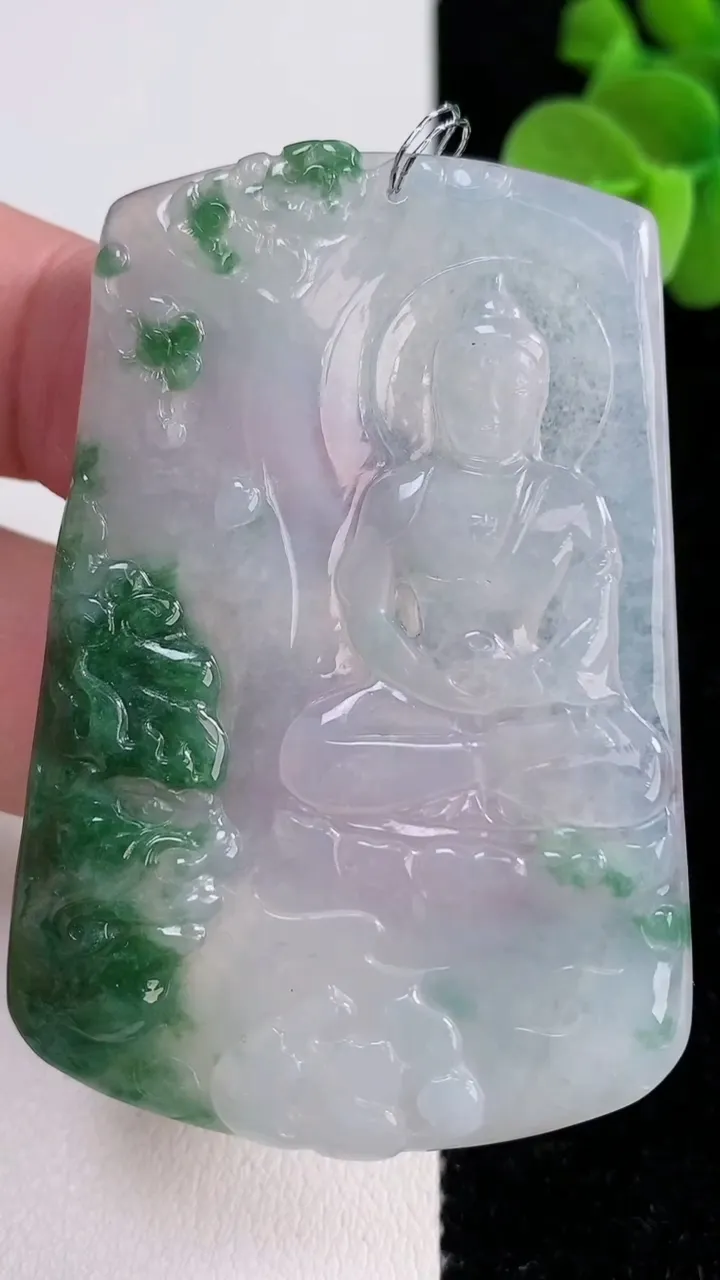 天然A货翡翠冰种飘花一念之间吊坠，尺寸60-41.2-4，重量:25.98g
12月14日