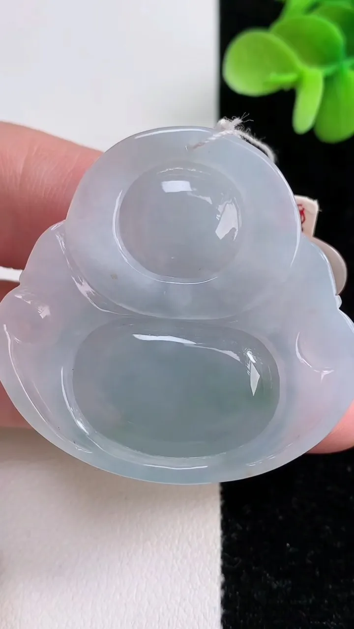 天然A货翡翠冰种飘花佛公吊坠，尺寸41.2-43.8-8.5，重量:25.44g
12月14日