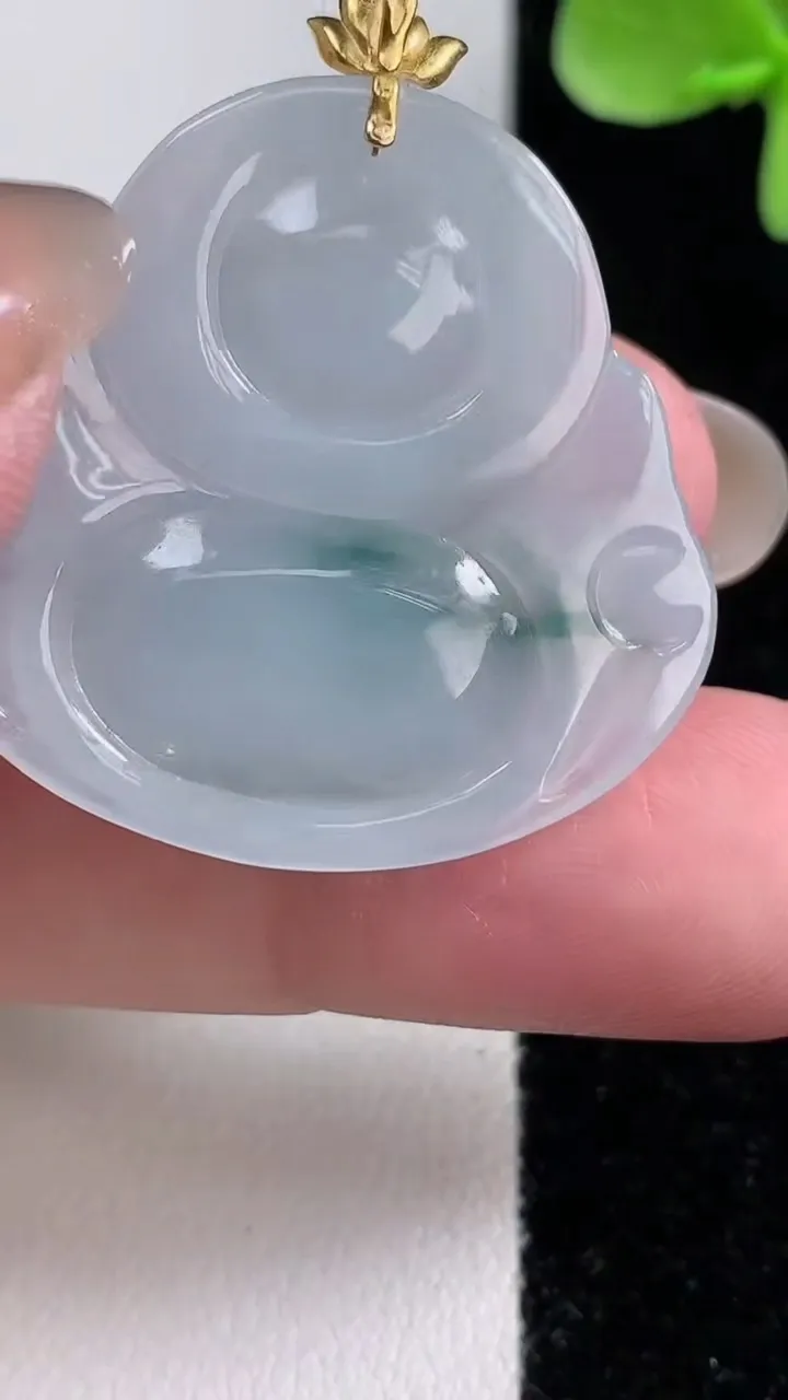 天然A货翡翠种飘花佛公吊坠，尺寸31.4-33.7-5.6，重量:9.62g
12月14日