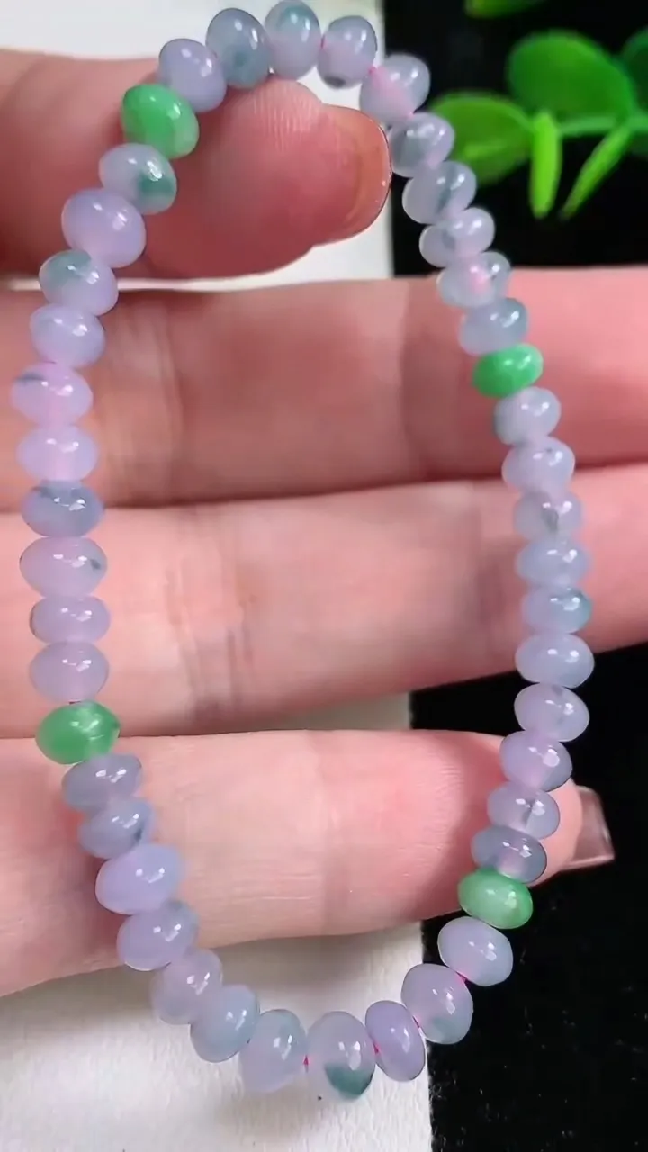 天然A货翡翠双彩紫罗兰算盘珠手串，尺寸5.6-3.3-45颗，重量:10.06g12月16日
工厂直销收藏佳品,种好水足，色泽均匀，有种有色，上手高大气！