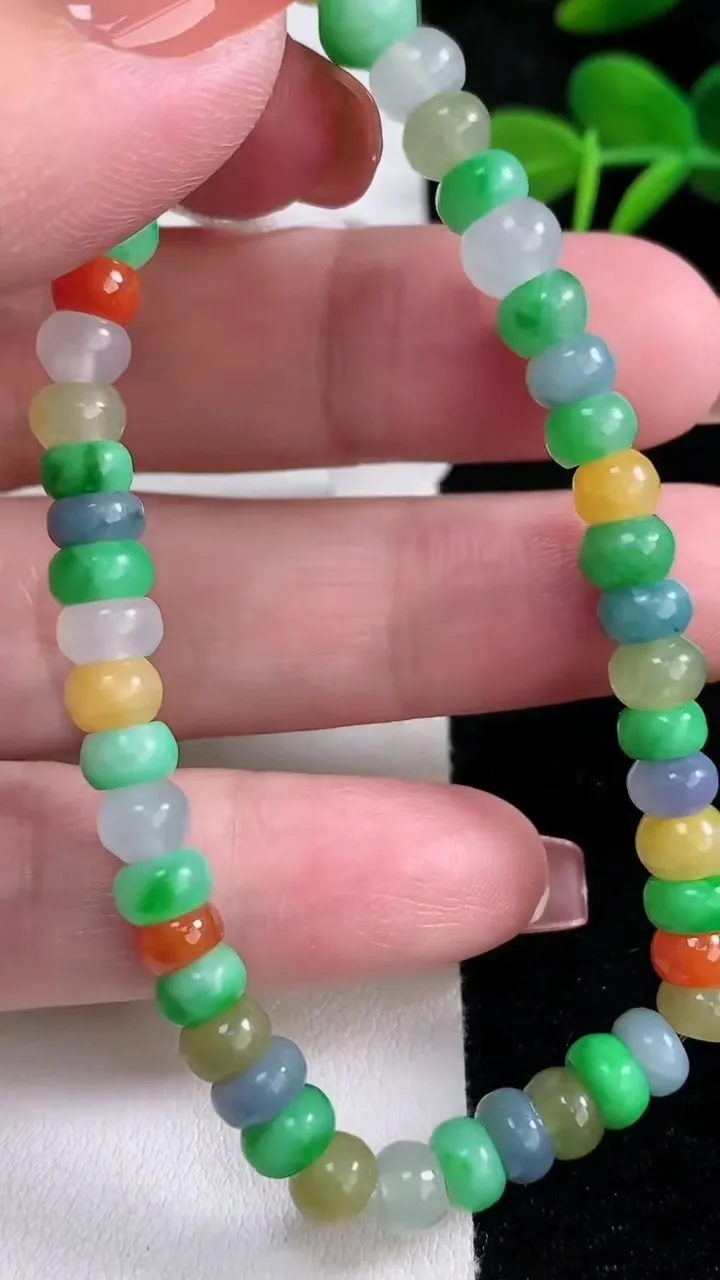 天然A货翡翠四彩算盘珠手串，尺寸6.5-4-48颗，重量:15.38g12月16日
工厂直销收藏佳品,种好水足，色泽均匀，有种有色，上手高大气！