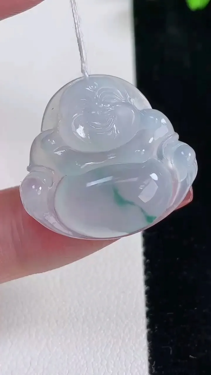 天然A货翡翠冰种飘花佛公吊坠，尺寸24.7-26.4-5.7，重量:5.95g
12月16日