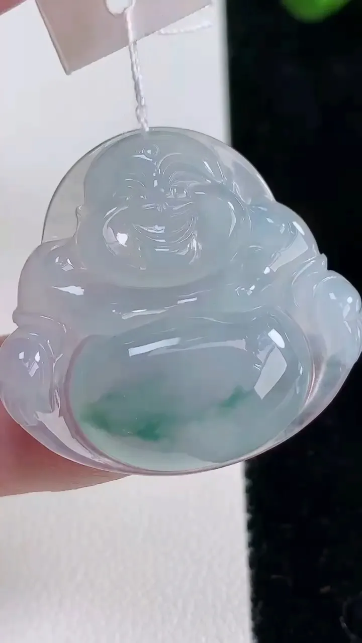 天然A货翡翠冰种飘花佛公吊坠，尺寸30-32-5.6，重量:8.38g
12月16日