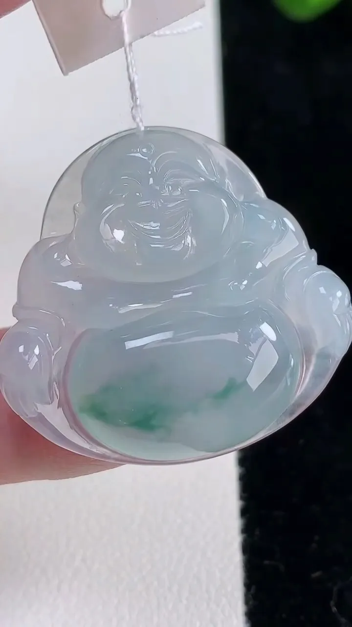 天然A货翡翠冰种飘花佛公吊坠，尺寸30-32-5.6，重量:8.38g
12月16日