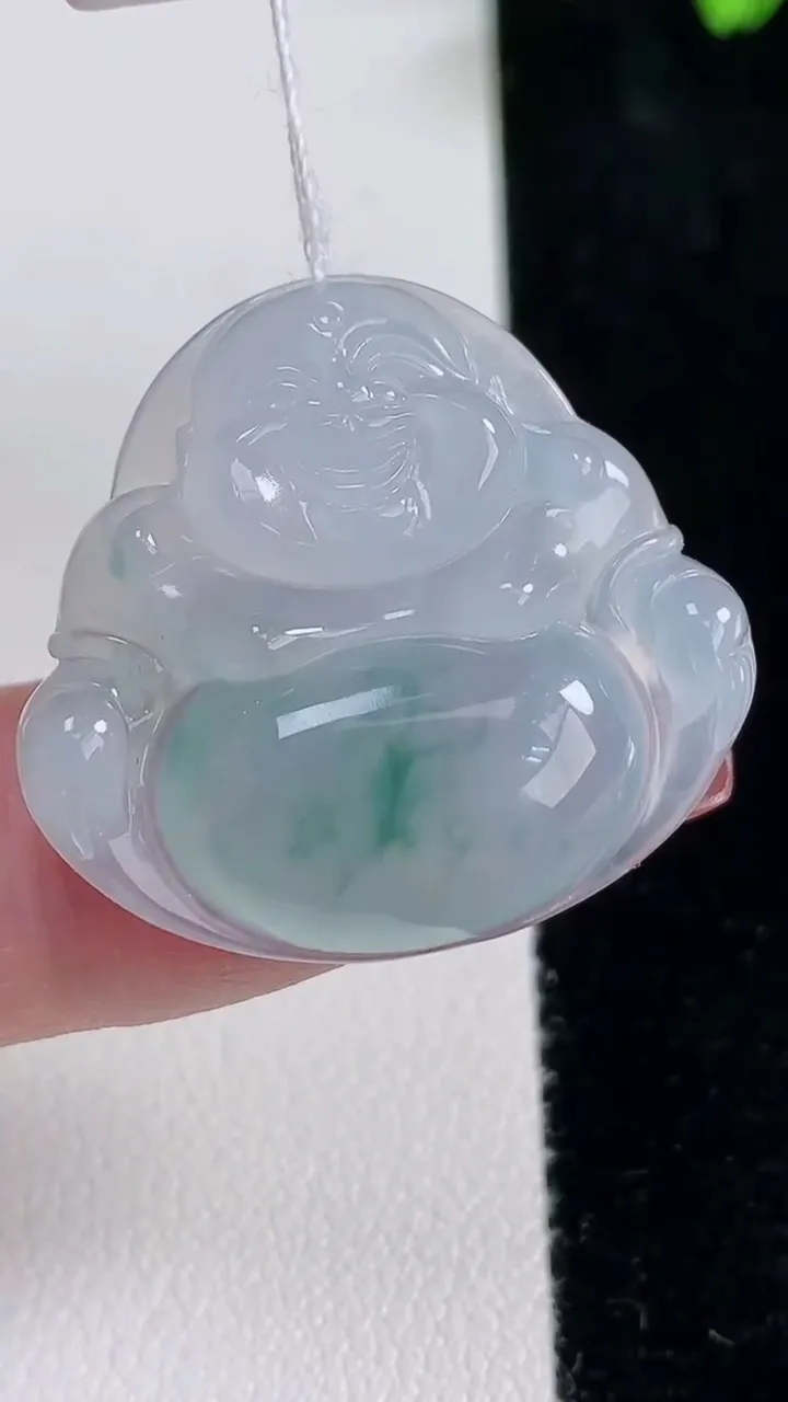 天然A货翡翠冰种飘花佛公吊坠，尺寸26.8-29-6，重量:7.48g
12月16日