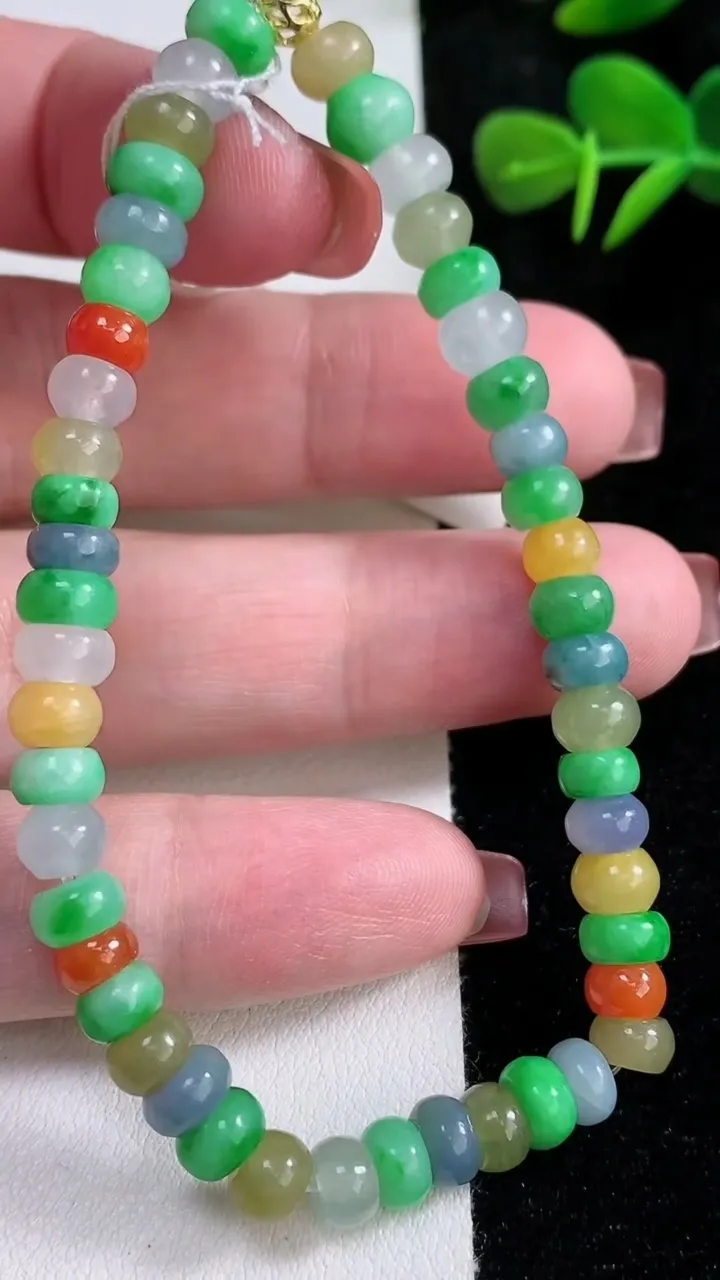 天然A货翡翠四彩算盘珠手串，尺寸6.5-4-48颗，重量:15.38g12月16日
工厂直销收藏佳品,种好水足，色泽均匀，有种有色，上手高大气！