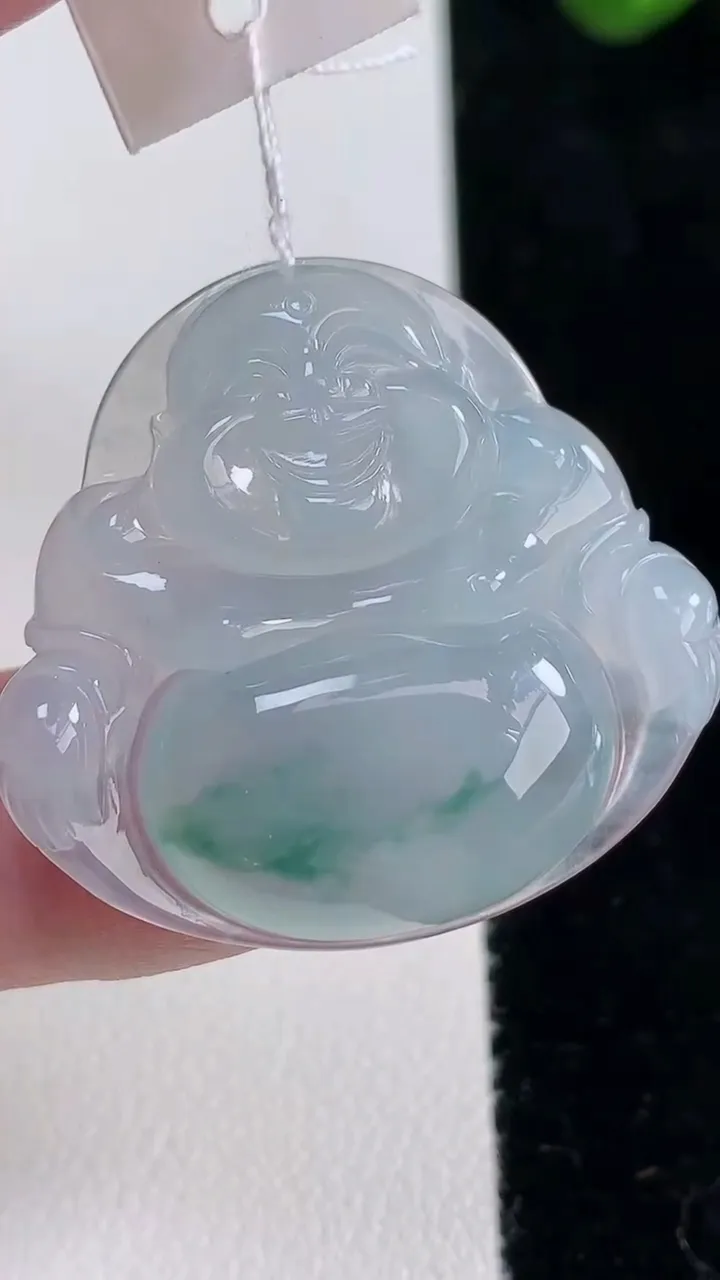 天然A货翡翠冰种飘花佛公吊坠，尺寸30-32-5.6，重量:8.38g
12月16日