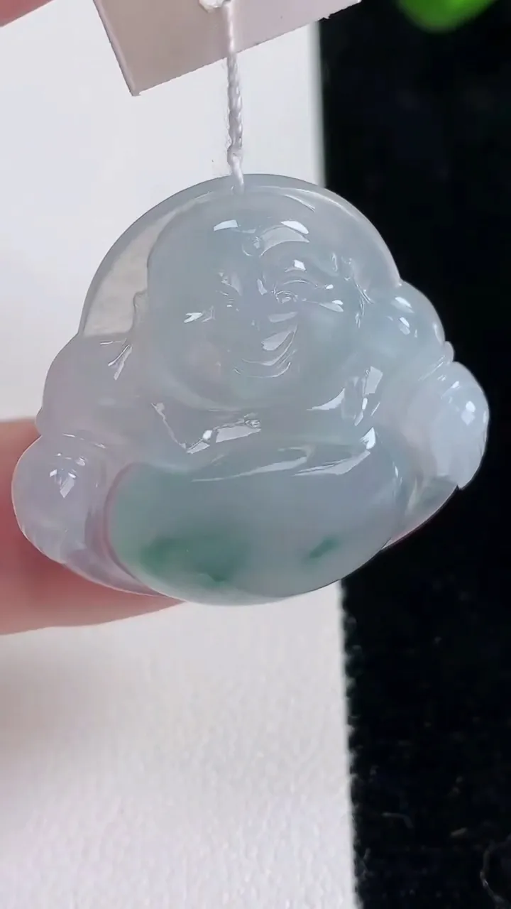 天然A货翡翠冰种飘花佛公吊坠，尺寸30-32-5.6，重量:8.38g
12月16日