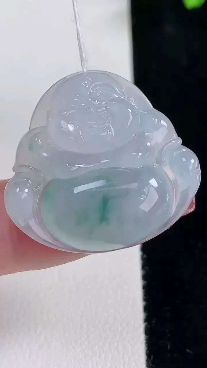 天然A货翡翠冰种飘花佛公吊坠，尺寸26.8-29-6，重量:7.48g
12月16日