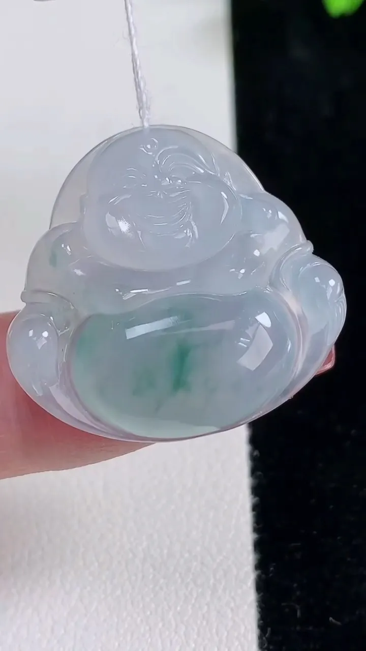 天然A货翡翠冰种飘花佛公吊坠，尺寸26.8-29-6，重量:7.48g
12月16日