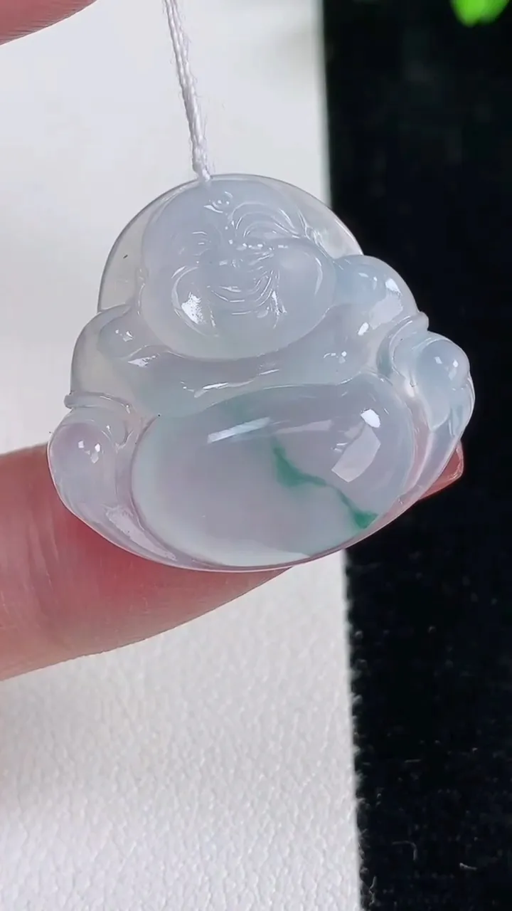 天然A货翡翠冰种飘花佛公吊坠，尺寸24.7-26.4-5.7，重量:5.95g
12月16日