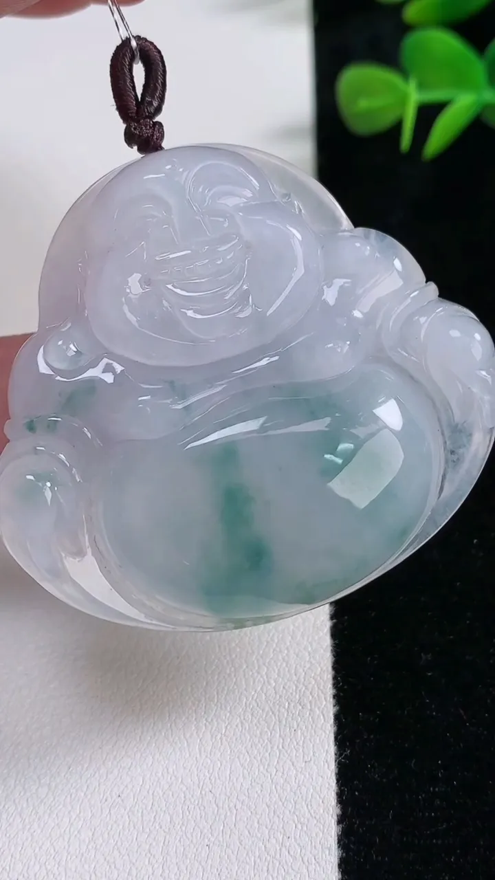 天然A货翡翠冰种飘花佛公吊坠，尺寸46.4-51-8.5，重量:29.57g
12月17日