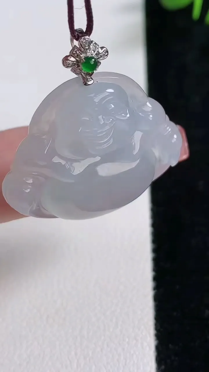 天然A货翡翠种飘花佛公吊坠，尺寸26.6-30-5.6，重量:7.35g
12月17日