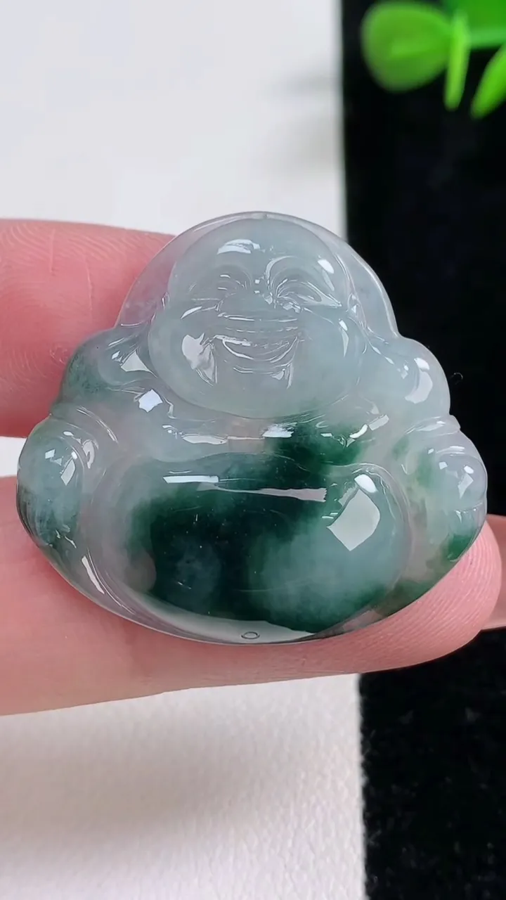 天然A货翡翠冰种飘花佛公吊坠，尺寸31-33.4-5，重量:7.63g
12月17日