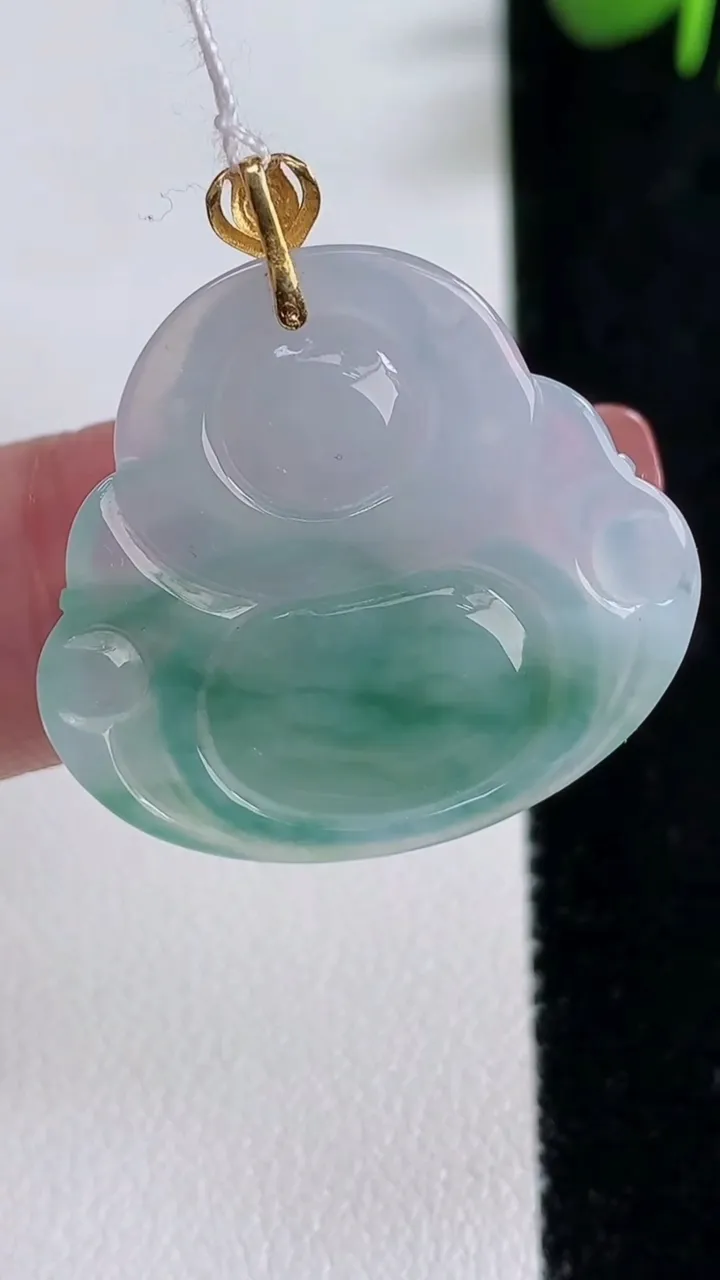 天然A货翡翠种飘花佛公吊坠，尺寸25.8-28.2-5.2，重量:5.90g
12月17日