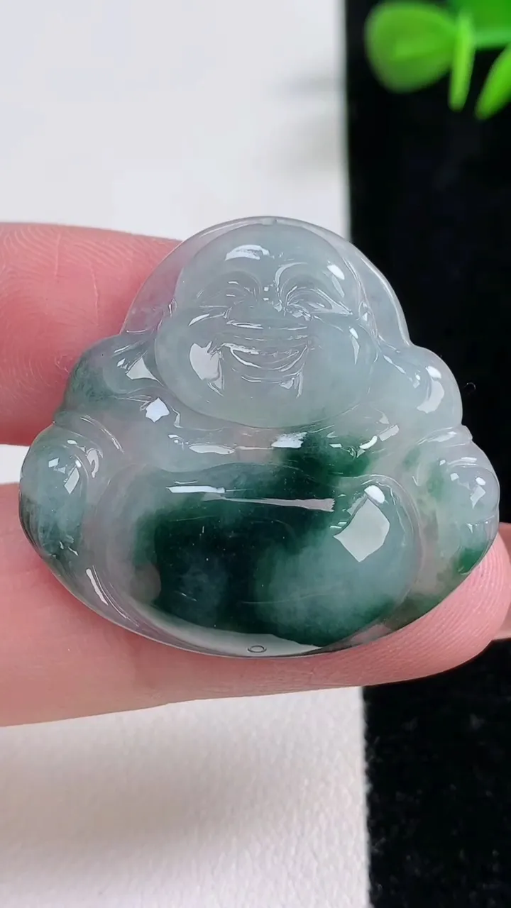 天然A货翡翠冰种飘花佛公吊坠，尺寸31-33.4-5，重量:7.63g
12月17日