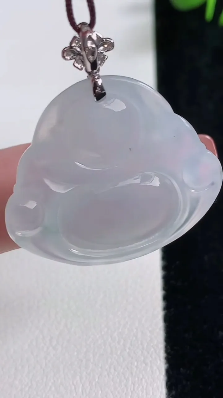 天然A货翡翠种飘花佛公吊坠，尺寸26.6-30-5.6，重量:7.35g
12月17日